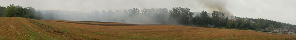 Dym z pożaru ściele się po polach (Czytelnik Mariusz)
